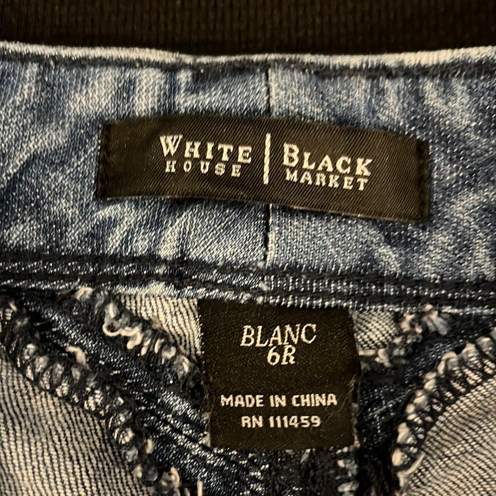 Boot cut jeans, distressed, good condition.